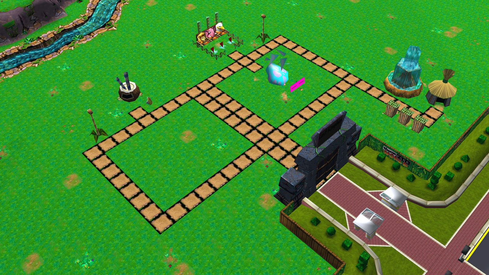 A starter park in the Lost Kingdom: paths, rides, a waterfall and the jungle entrance gate